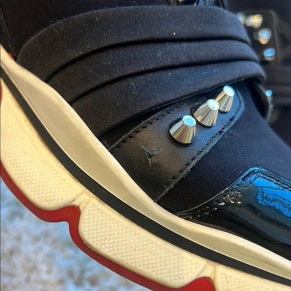 Authentic Christian Louboutin Black and Silver Studded Sneakers - Picture 2 of 11